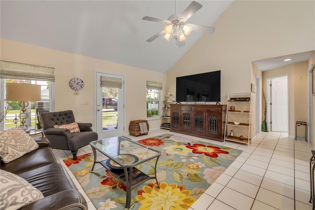 527 Old Minorcan Trl, New Smyrna Beach, FL 32168 - living room featuring high vaulted ceiling, healthy amount of natural light, light tile patterned floors, a ceiling fan, and recessed lighting