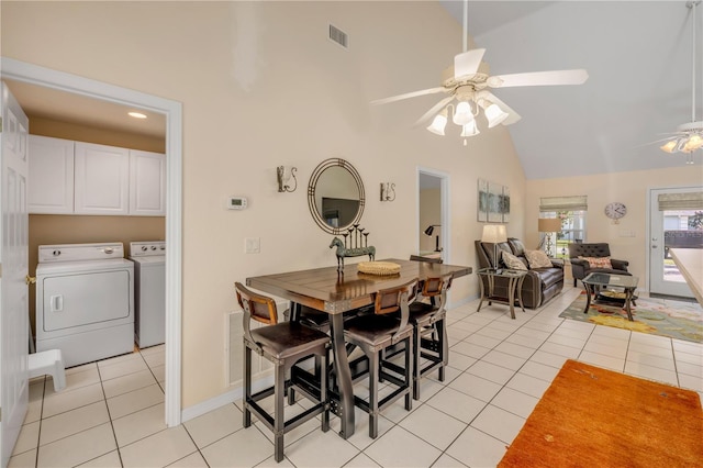 527 Old Minorcan Trl, New Smyrna Beach, FL 32168 - dining room featuring washing machine and clothes dryer, a ceiling fan, light tile patterned floors, high vaulted ceiling, and recessed lighting