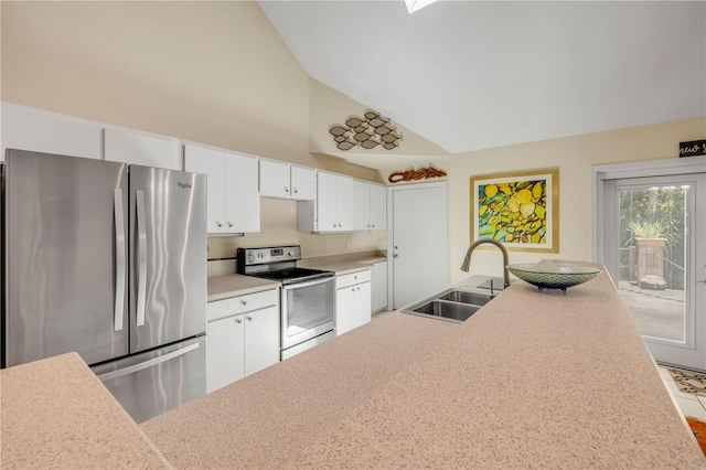 527 Old Minorcan Trl, New Smyrna Beach, FL 32168 - kitchen featuring freestanding refrigerator, electric range oven, high vaulted ceiling, white cabinets, and light countertops