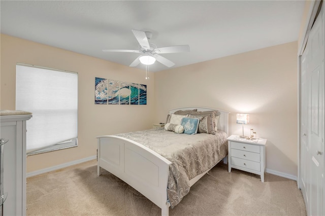 527 Old Minorcan Trl, New Smyrna Beach, FL 32168 - bedroom with a closet, light colored carpet, and ceiling fan