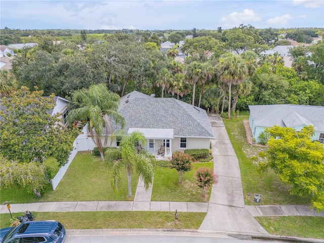 527 Old Minorcan Trl, New Smyrna Beach, FL 32168 - view from above of property with a tree filled landscape