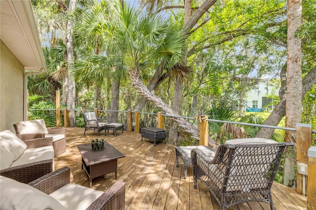 527 Old Minorcan Trl, New Smyrna Beach, FL 32168 - deck with an outdoor living space
