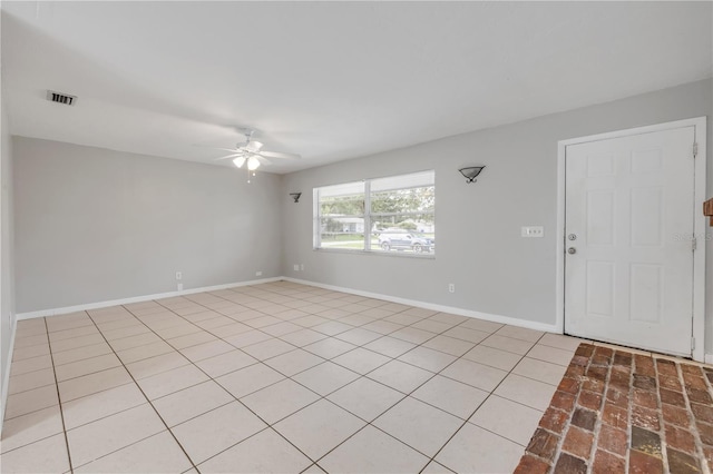 3132 Pine Tree Dr, Edgewater, FL 32141 - spare room featuring ceiling fan and baseboards