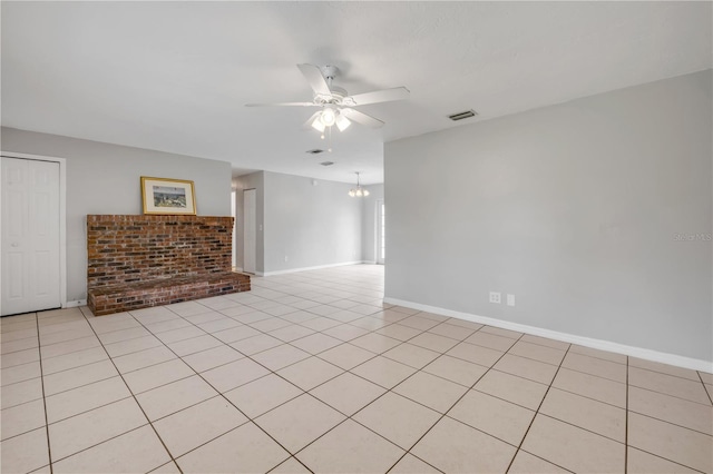 3132 Pine Tree Dr, Edgewater, FL 32141 - empty room with ceiling fan and light tile patterned floors