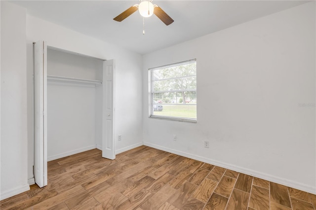 3132 Pine Tree Dr, Edgewater, FL 32141 - unfurnished bedroom featuring light wood-type flooring, a closet, and ceiling fan
