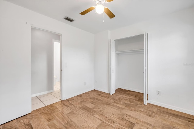 3132 Pine Tree Dr, Edgewater, FL 32141 - unfurnished bedroom featuring ceiling fan and a closet