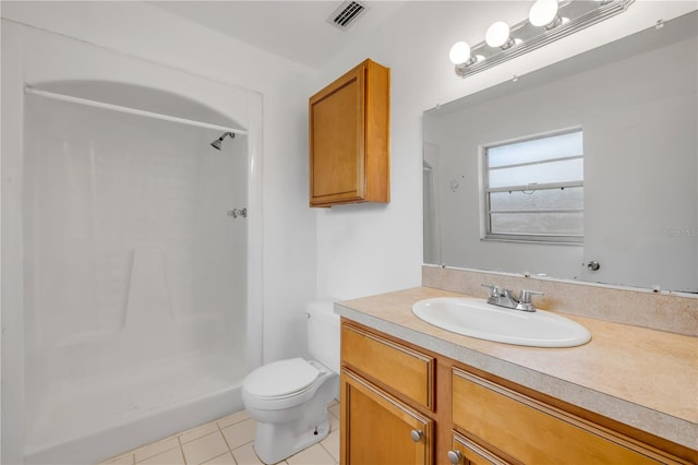 3132 Pine Tree Dr, Edgewater, FL 32141 - bathroom with tile patterned flooring, vanity, and a shower
