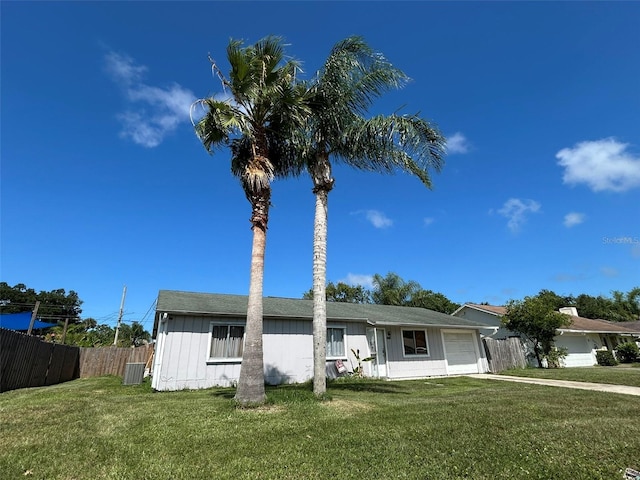 3407 Vista Palm Dr, Edgewater, FL 32141 - ranch-style house with an attached garage, board and batten siding, and driveway