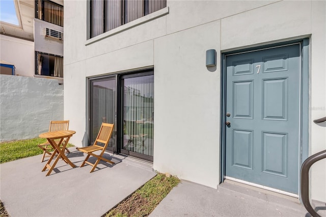1404 N Atlantic Ave Unit 70, Daytona Beach, FL 32118 - view of exterior entry with stucco siding