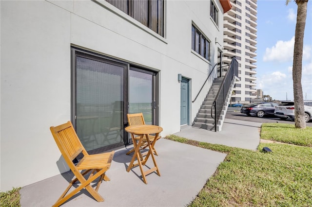 1404 N Atlantic Ave Unit 70, Daytona Beach, FL 32118 - view of patio with stairs