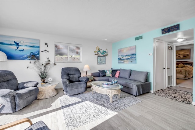 1404 N Atlantic Ave Unit 70, Daytona Beach, FL 32118 - living room with wood finished floors and baseboards