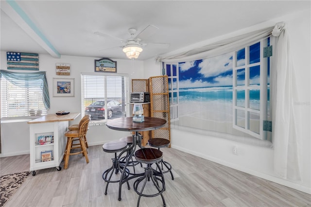 1404 N Atlantic Ave Unit 70, Daytona Beach, FL 32118 - dining space featuring ceiling fan and light wood-style flooring
