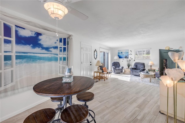 1404 N Atlantic Ave Unit 70, Daytona Beach, FL 32118 - dining space featuring wood finished floors and ceiling fan