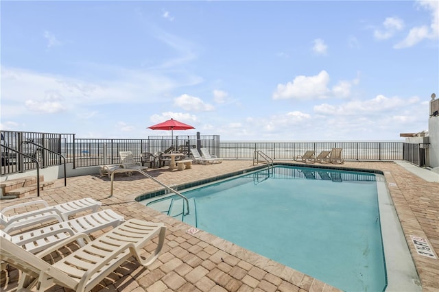 1404 N Atlantic Ave Unit 70, Daytona Beach, FL 32118 - community pool featuring a patio area