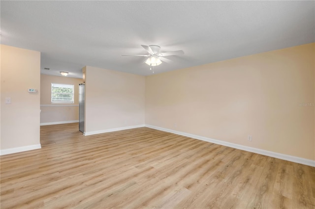 1750 S Palmetto Ave Unit 24, Daytona Beach, FL 32119 - empty room with a ceiling fan and light wood-type flooring