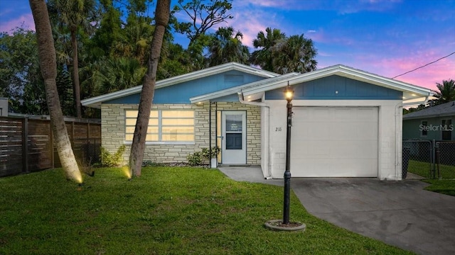 211 Fox Pl, Port Orange, FL 32127 - ranch-style home with driveway and a garage