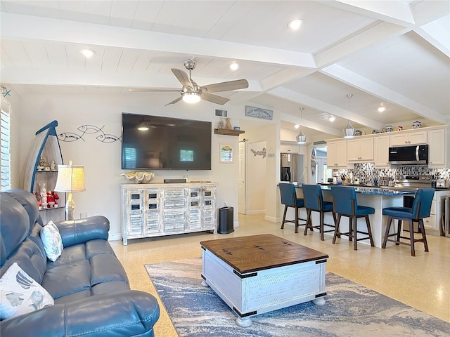 657 S Pine St, New Smyrna Beach, FL 32169 - living area featuring a ceiling fan and recessed lighting