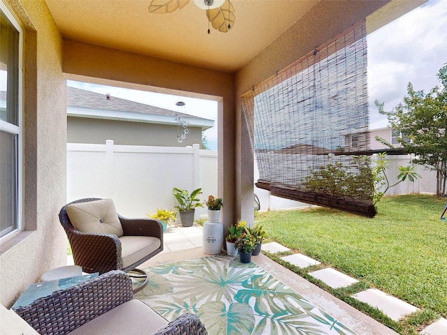 2731 Star Coral Ln, New Smyrna Beach, FL 32168 - fenced backyard featuring a ceiling fan