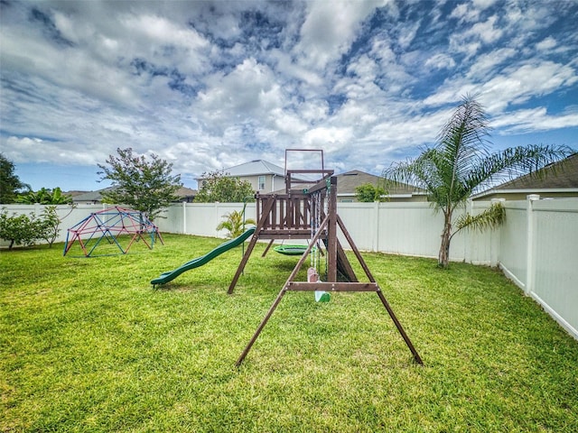 2731 Star Coral Ln, New Smyrna Beach, FL 32168 - view of playground featuring a fenced backyard