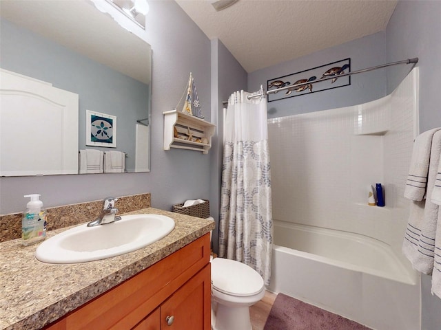 2731 Star Coral Ln, New Smyrna Beach, FL 32168 - bathroom with vanity, shower / bathtub combination with curtain, wood finished floors, and a textured ceiling
