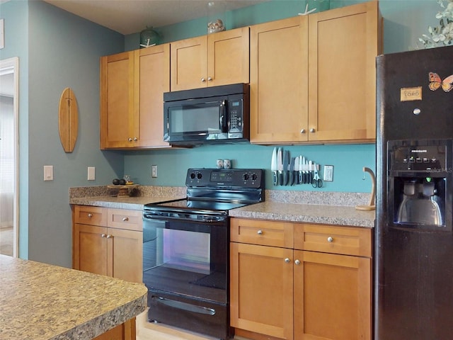 2731 Star Coral Ln, New Smyrna Beach, FL 32168 - kitchen with black appliances and light countertops