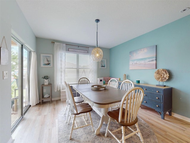 2731 Star Coral Ln, New Smyrna Beach, FL 32168 - dining space featuring light wood-style floors