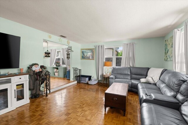 20 Putnam Ave, Ormond Beach, FL 32174 - living room with a textured ceiling