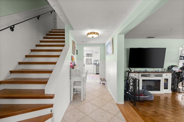 20 Putnam Ave, Ormond Beach, FL 32174 - stairway with a wainscoted wall