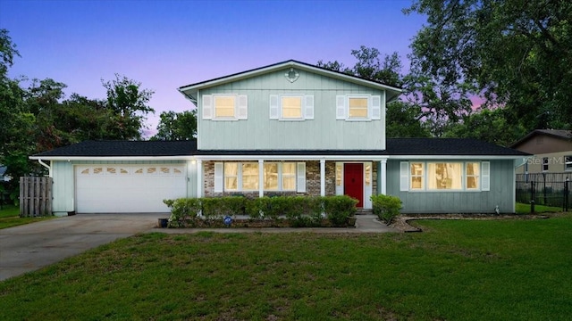 20 Putnam Ave, Ormond Beach, FL 32174 - traditional-style house with an attached garage, concrete driveway, and stone siding