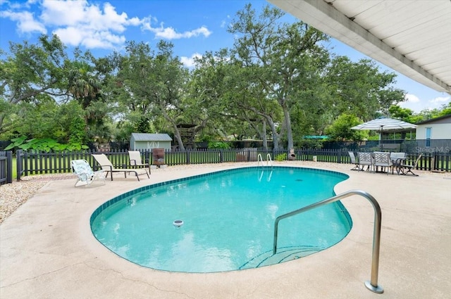 20 Putnam Ave, Ormond Beach, FL 32174 - view of pool featuring a patio area and view of scattered trees