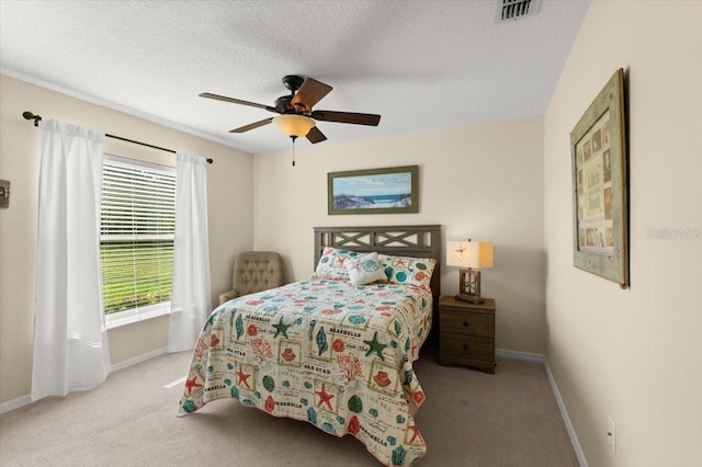318 Two Oaks Dr, Edgewater, FL 32141 - carpeted bedroom featuring ceiling fan and a textured ceiling