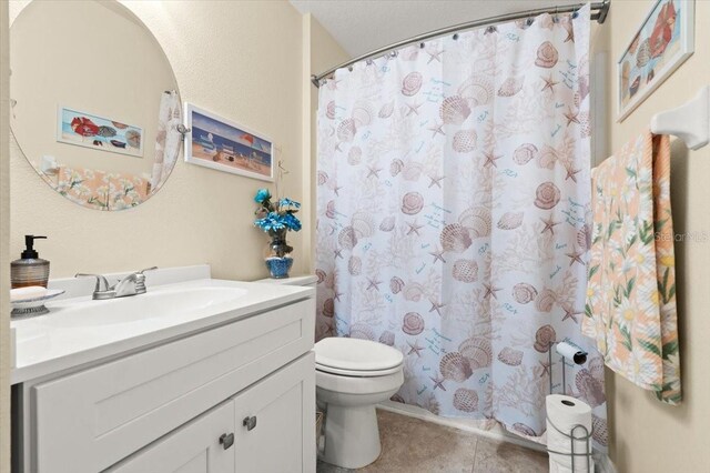 318 Two Oaks Dr, Edgewater, FL 32141 - full bath with vanity, tile patterned flooring, and a shower with shower curtain
