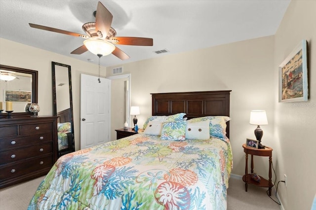 318 Two Oaks Dr, Edgewater, FL 32141 - bedroom with light carpet and ceiling fan