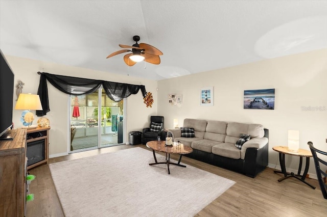 318 Two Oaks Dr, Edgewater, FL 32141 - living area with ceiling fan and wood finished floors