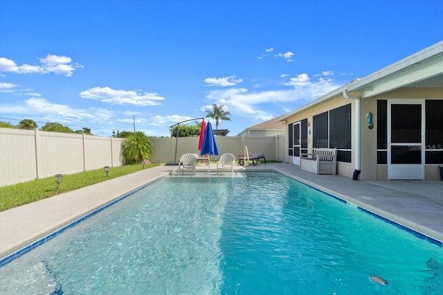 318 Two Oaks Dr, Edgewater, FL 32141 - view of swimming pool with a fenced backyard, a patio, and a sunroom