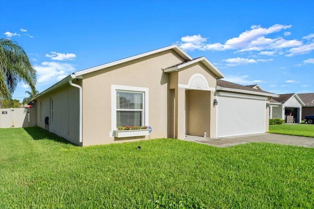318 Two Oaks Dr, Edgewater, FL 32141 - single story home with stucco siding, driveway, and an attached garage