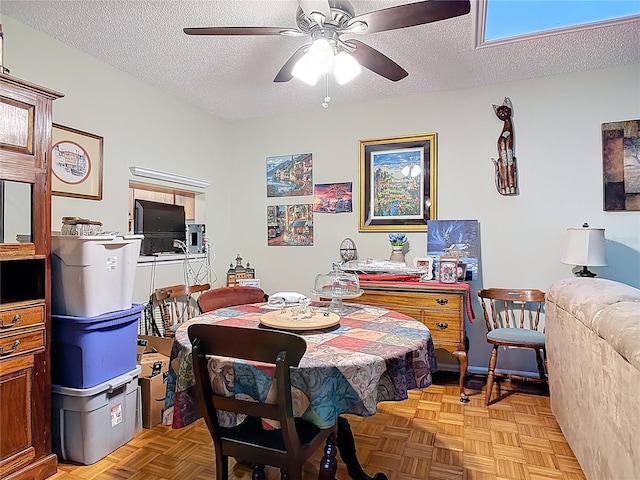44 Fore Dr, New Smyrna Beach, FL 32168 - dining room with ceiling fan and a textured ceiling