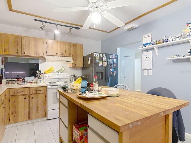 44 Fore Dr, New Smyrna Beach, FL 32168 - kitchen featuring electric stove, stainless steel fridge with ice dispenser, under cabinet range hood, ceiling fan, and butcher block counters