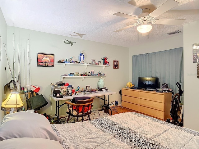 44 Fore Dr, New Smyrna Beach, FL 32168 - bedroom with a textured ceiling and a ceiling fan