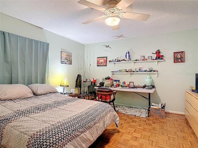 44 Fore Dr, New Smyrna Beach, FL 32168 - bedroom featuring a textured ceiling and ceiling fan