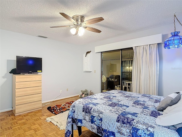 44 Fore Dr, New Smyrna Beach, FL 32168 - bedroom with a textured ceiling, a ceiling fan, and a closet