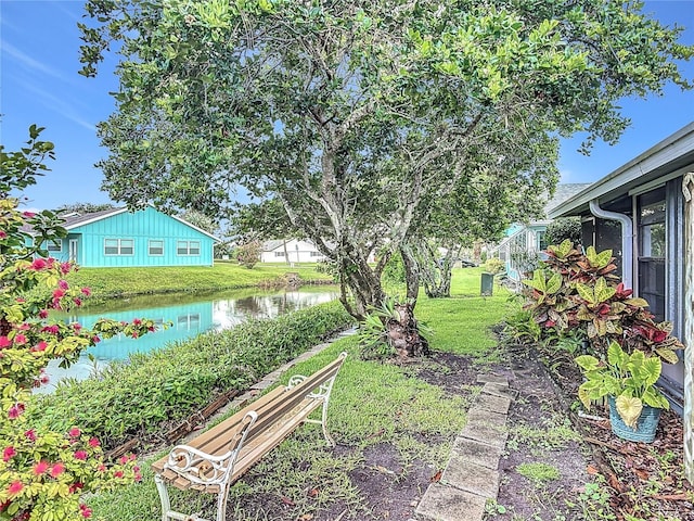44 Fore Dr, New Smyrna Beach, FL 32168 - view of green lawn featuring a water view