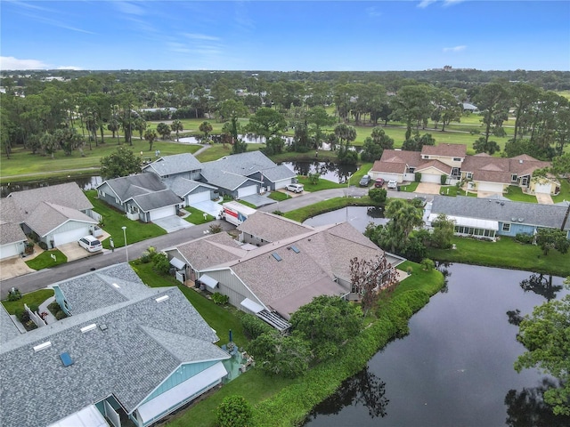 44 Fore Dr, New Smyrna Beach, FL 32168 - aerial view of residential area with a large body of water and a tree filled landscape