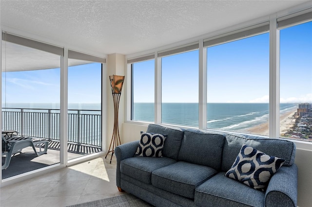 2625 S Atlantic Ave Unit 28Se, Daytona Beach Shores, FL 32118 - sunroom featuring a water view