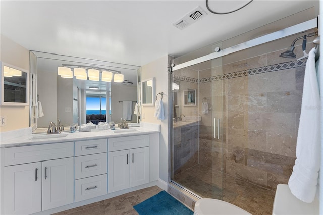 2625 S Atlantic Ave Unit 28Se, Daytona Beach Shores, FL 32118 - full bathroom with double vanity and a stall shower