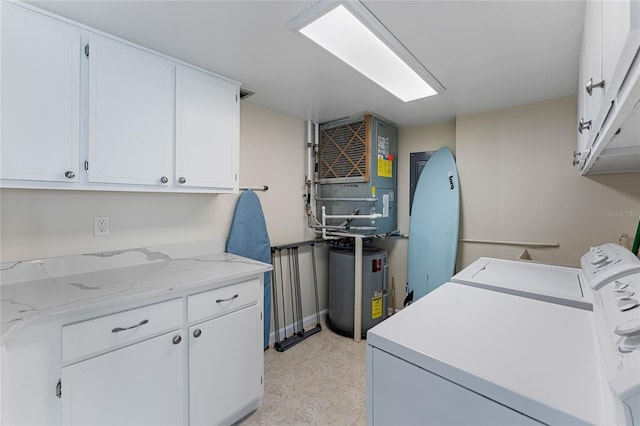 2625 S Atlantic Ave Unit 28Se, Daytona Beach Shores, FL 32118 - laundry area featuring washer and clothes dryer and cabinet space