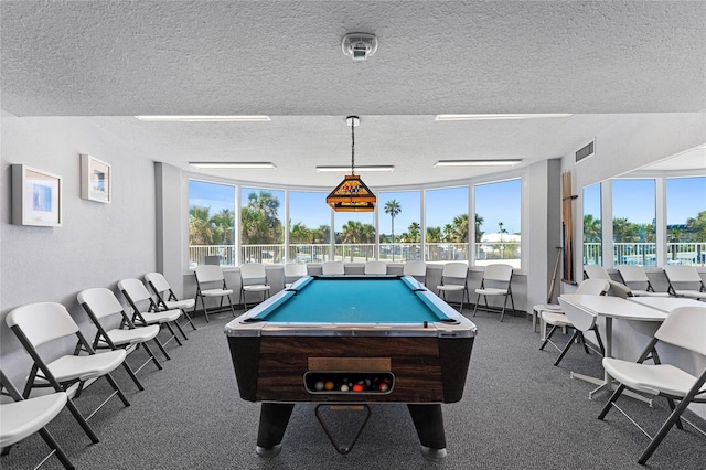 2625 S Atlantic Ave Unit 28Se, Daytona Beach Shores, FL 32118 - playroom with a textured ceiling, healthy amount of natural light, carpet floors, and billiards