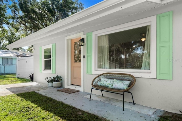 129 Rogers Pl, Port Orange, FL 32127 - property entrance featuring stucco siding