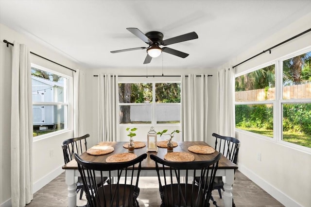 129 Rogers Pl, Port Orange, FL 32127 - dining room featuring baseboards and ceiling fan