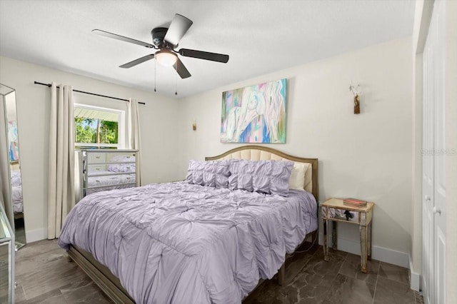 129 Rogers Pl, Port Orange, FL 32127 - bedroom with baseboards and ceiling fan